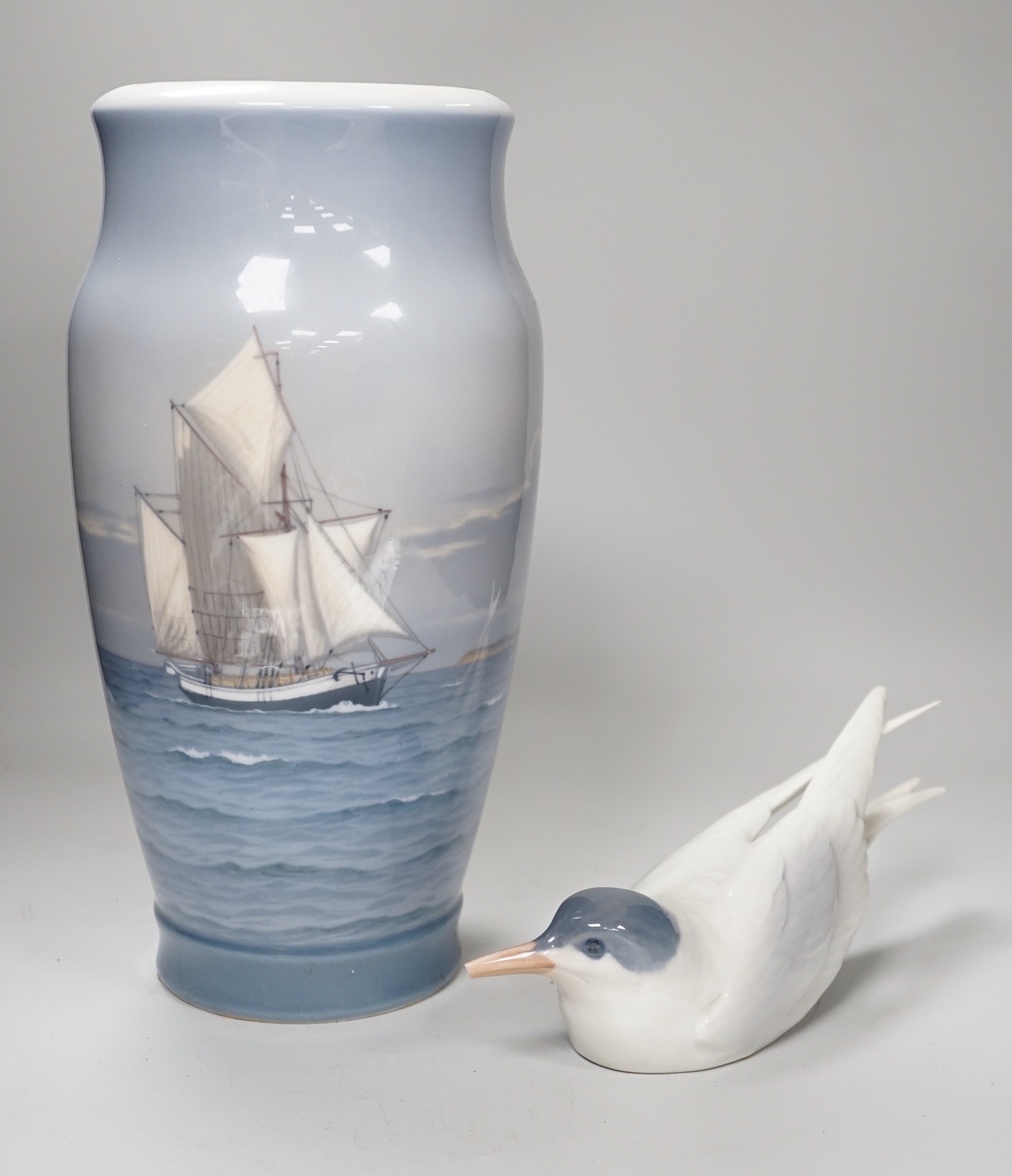 A Royal Copenhagen model of a tern and a similar vase, 34cm tall